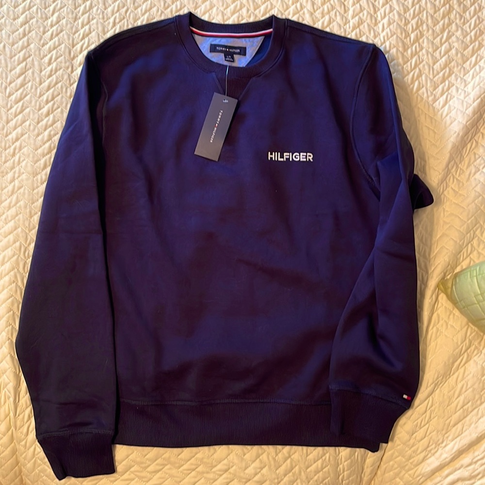 This is a brand new navy Tommy Hilfiger sweatshirt. Tags are still on.